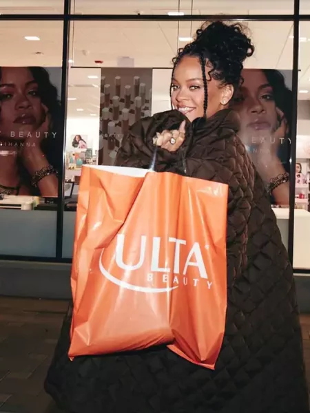 African American black woman "Rihanna" is shopping and smiling
