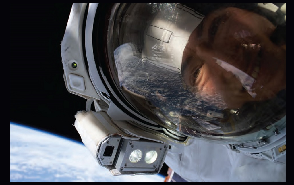 NASA astronaut Christina Koch takes an out-of-this-world “space-selfie” with the Earth behind her.