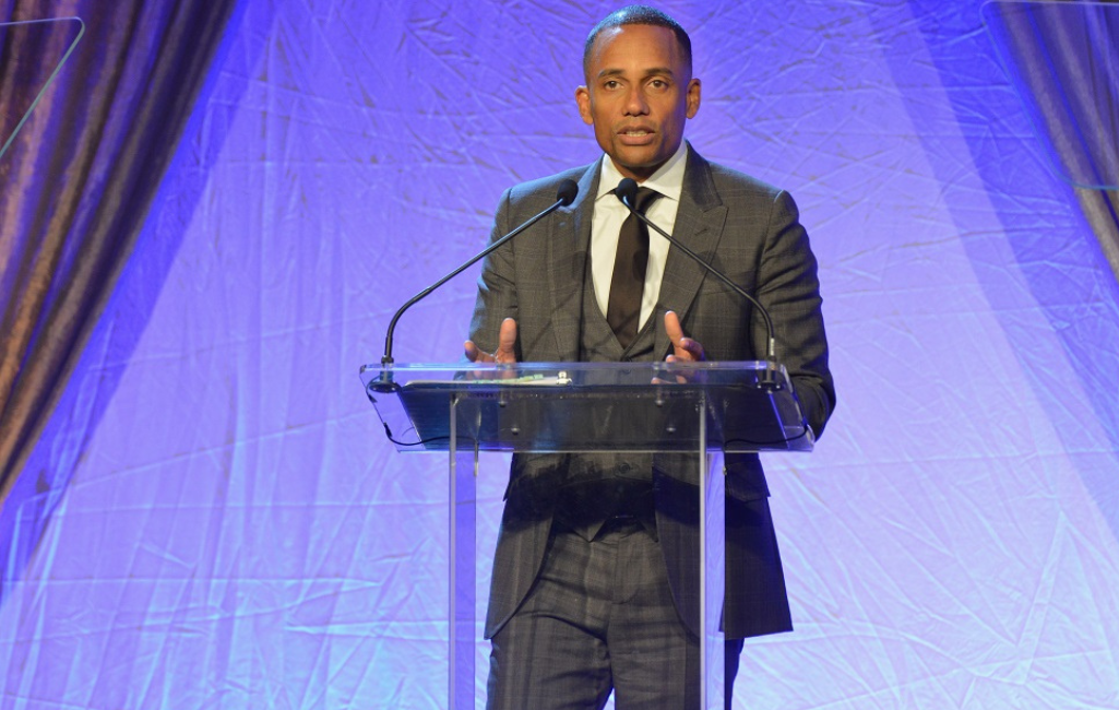Hill Harper speaks at podium after receiving the Muhammad Ali Education Award during The Muhammad Ali Humanitarian Awards in Louisville, Kentucky