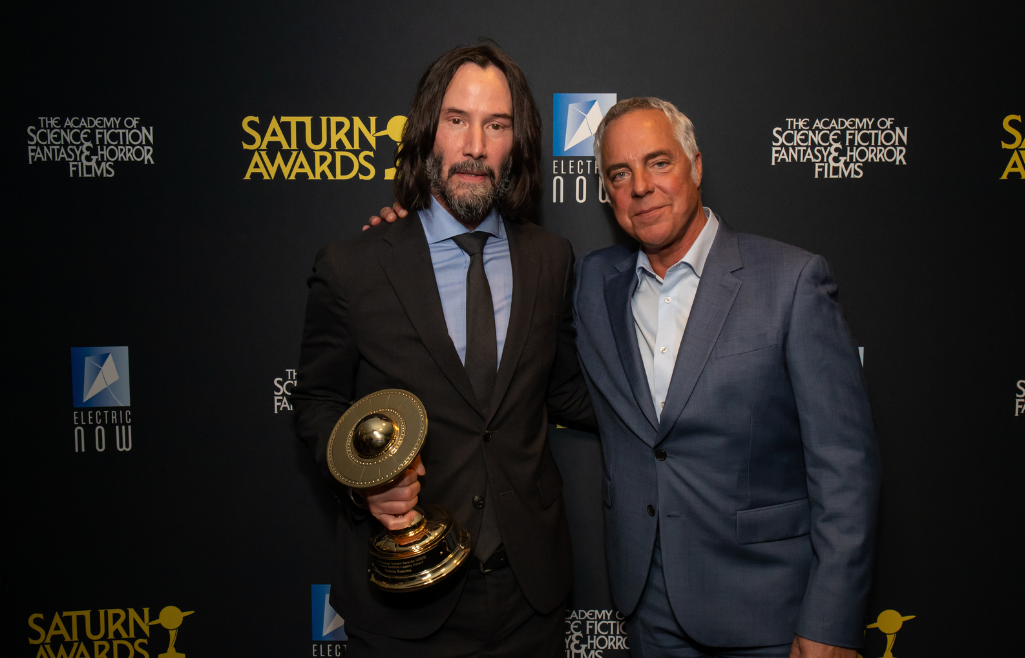 Keanu Reeves accepting Saturn Award onstage