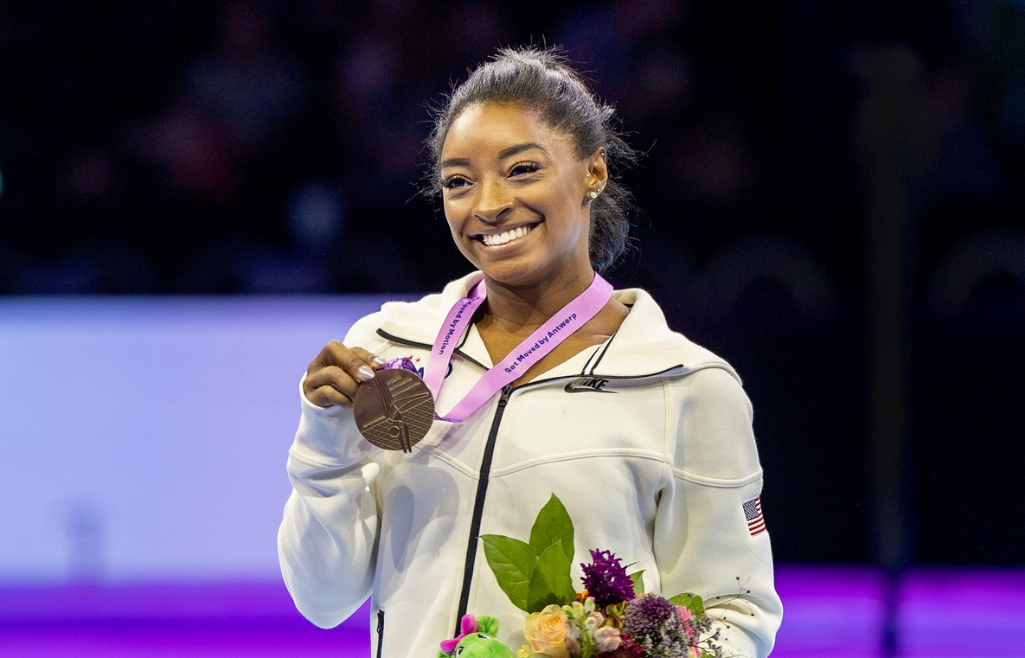 Simone Biles on the podium with her gold medal after her victory